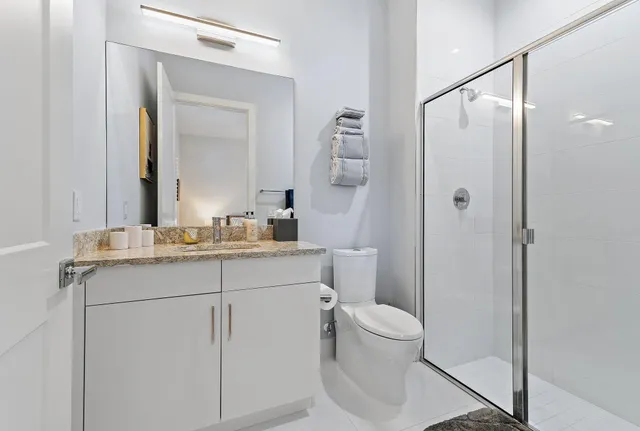 a view of an outdoor dining space with furniture and garden