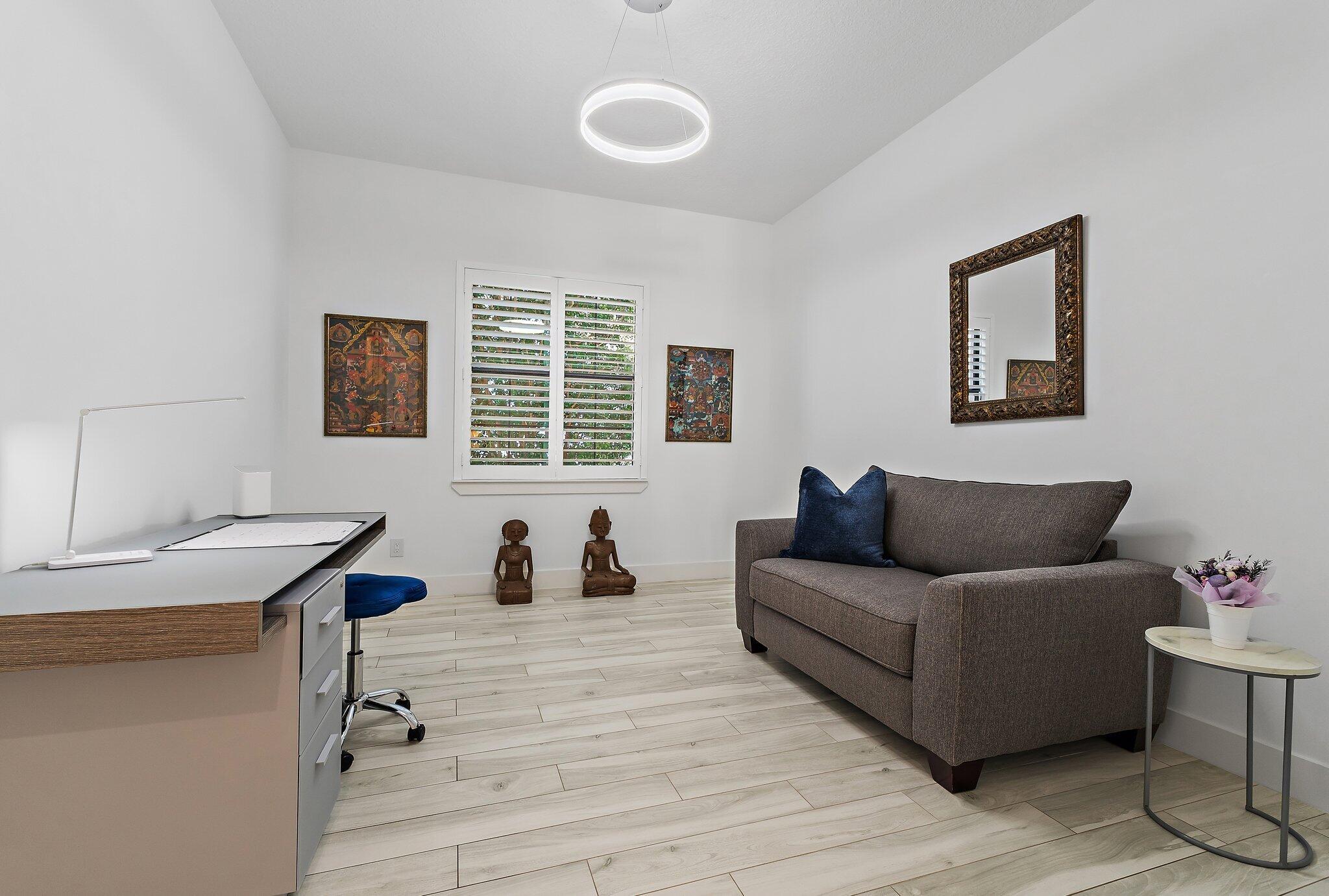 2908 Gin Berry Way West Palm Beach, FL 33401 - Photo 30 of 70 a living room with furniture and a window