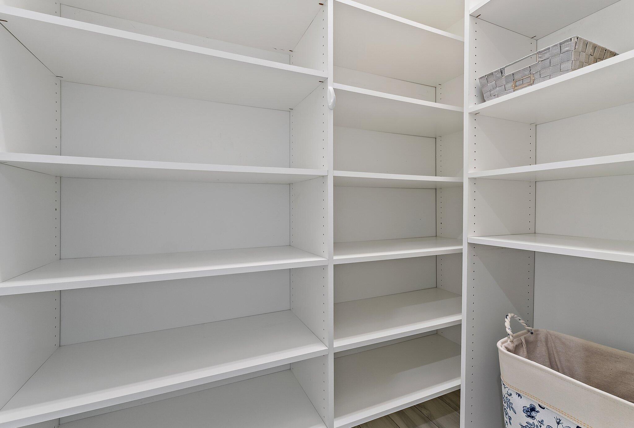 2908 Gin Berry Way West Palm Beach, FL 33401 - Photo 33 of 70 a view of walk in closet with empty racks