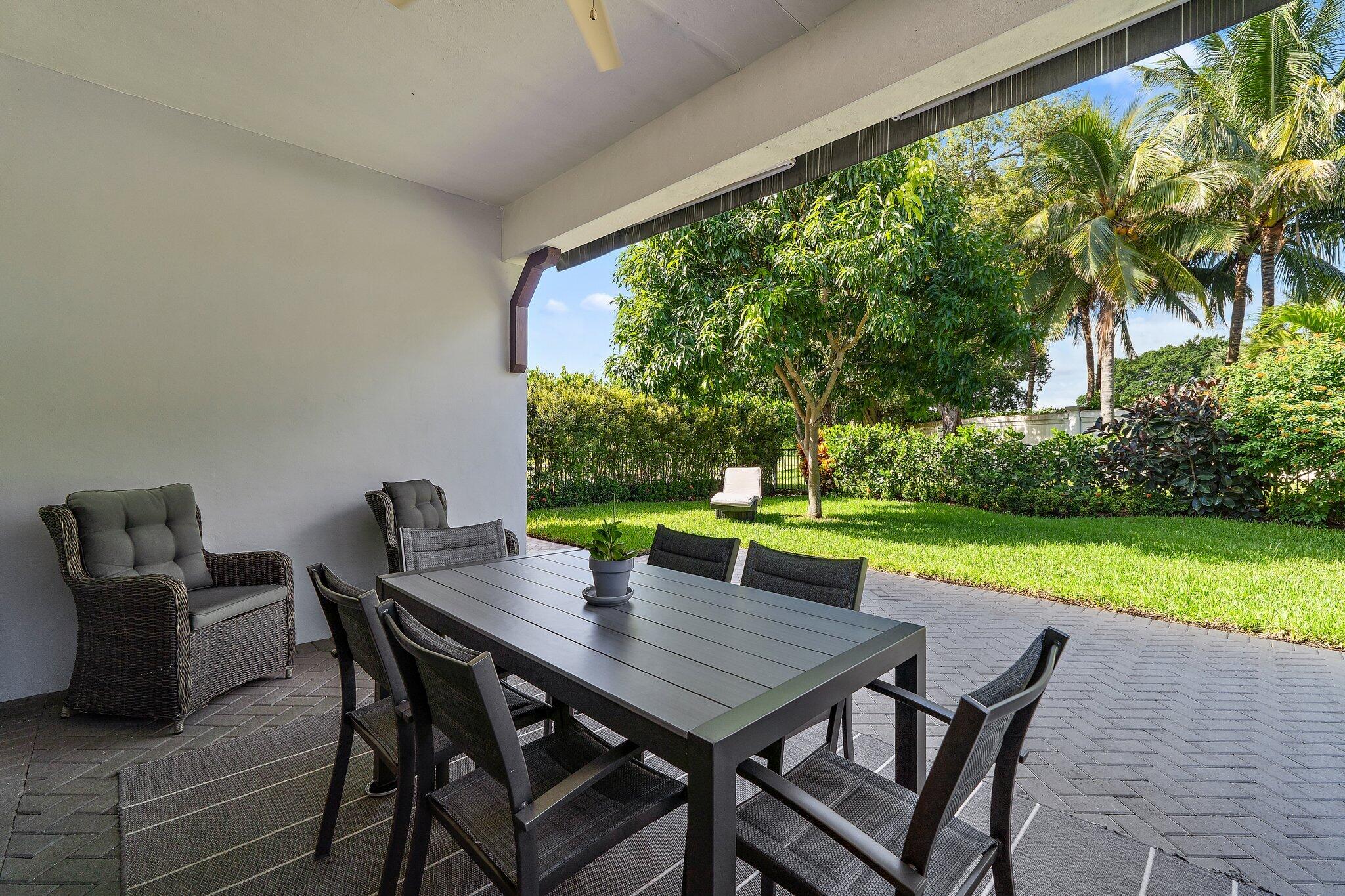 2908 Gin Berry Way West Palm Beach, FL 33401 - Photo 38 of 70 Covered Patio