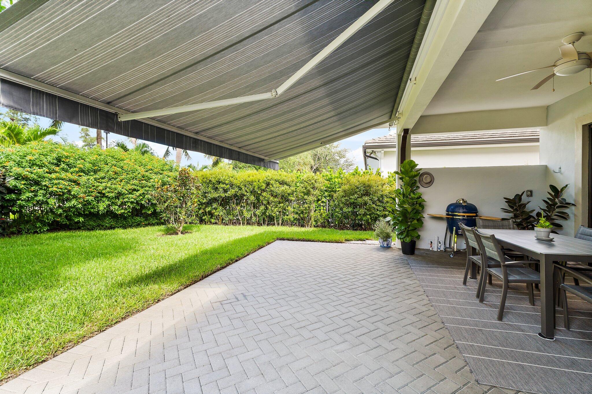 2908 Gin Berry Way West Palm Beach, FL 33401 - Photo 46 of 70 Patio with Awning