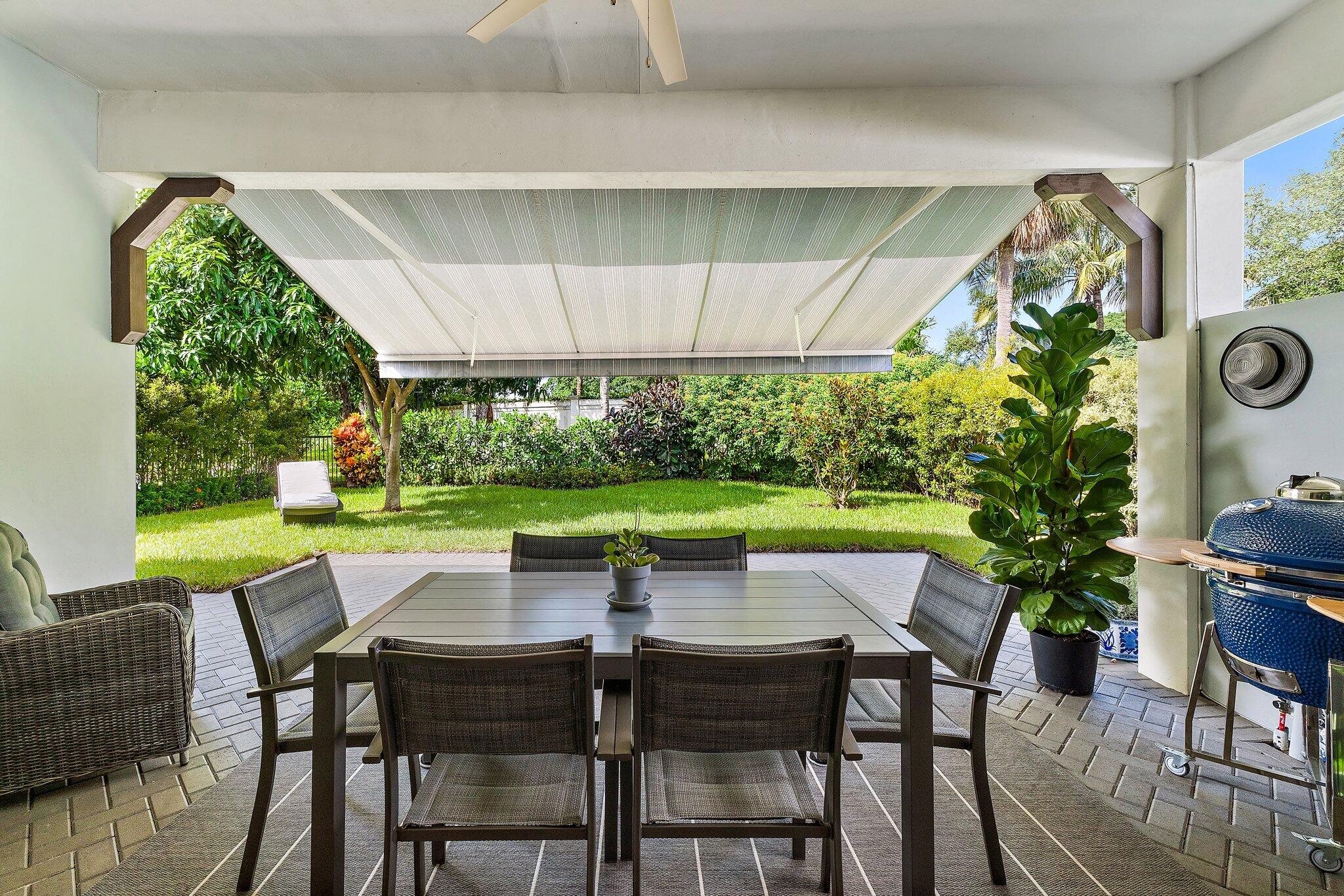 2908 Gin Berry Way West Palm Beach, FL 33401 - Photo 47 of 70 Patio with Awning