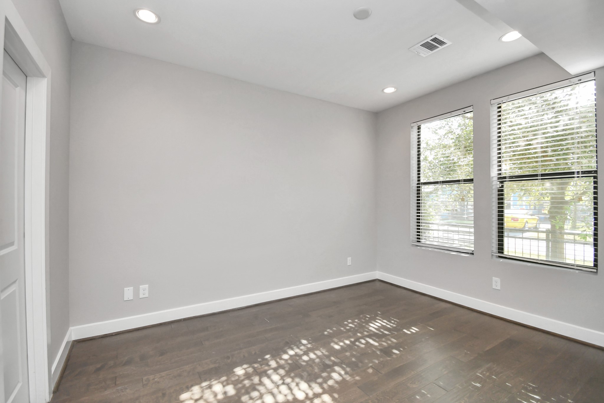 308 Palmer Street Houston, TX 77003 - Photo 14 of 36 a view of an empty room with a window