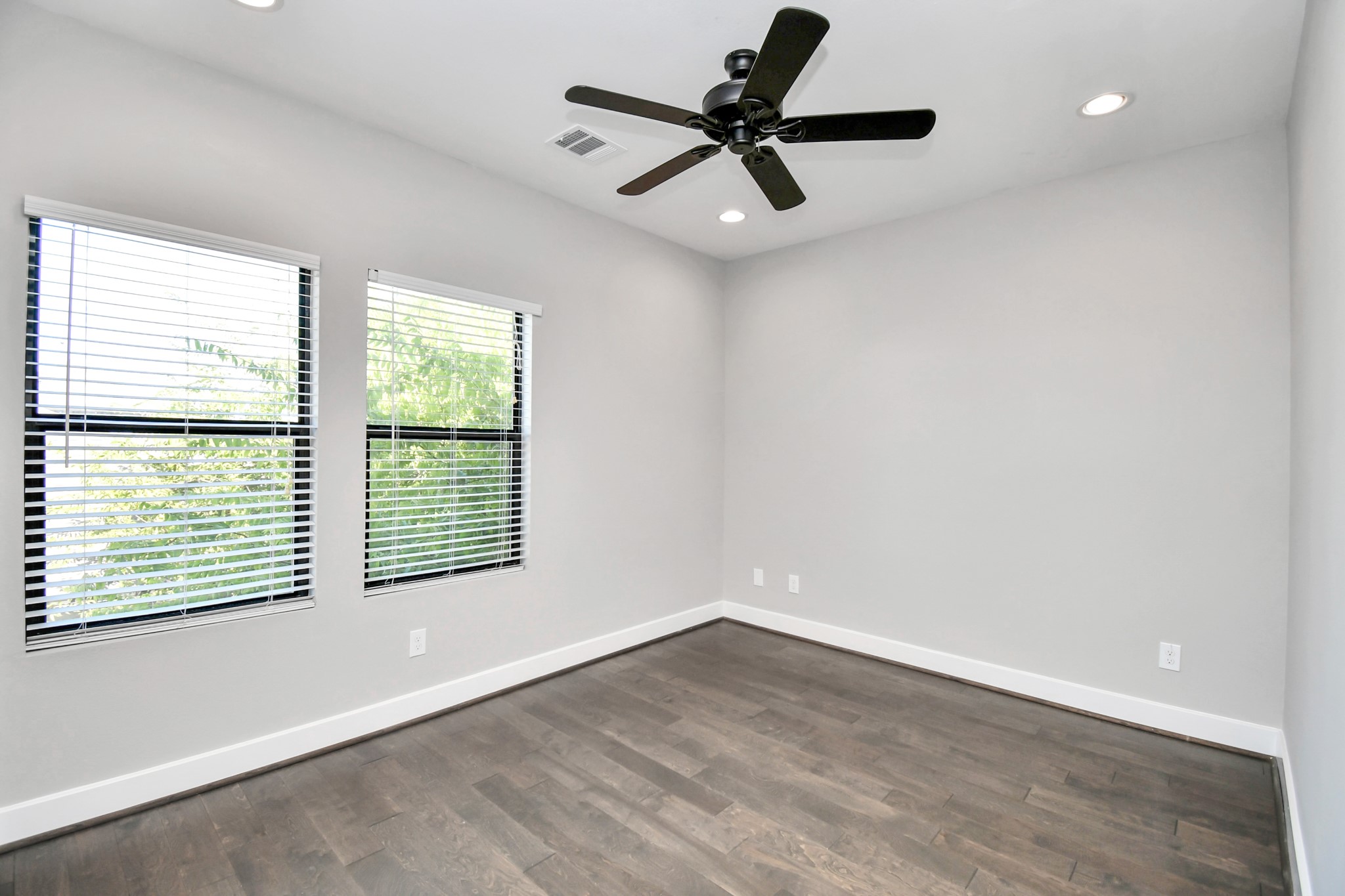 308 Palmer Street Houston, TX 77003 - Photo 28 of 36 wooden floor in an empty room with a window