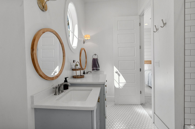 2917 Old Farm Road Washington, UT 84780 - Photo 62 of 105 Bathroom with vanity and baseboards