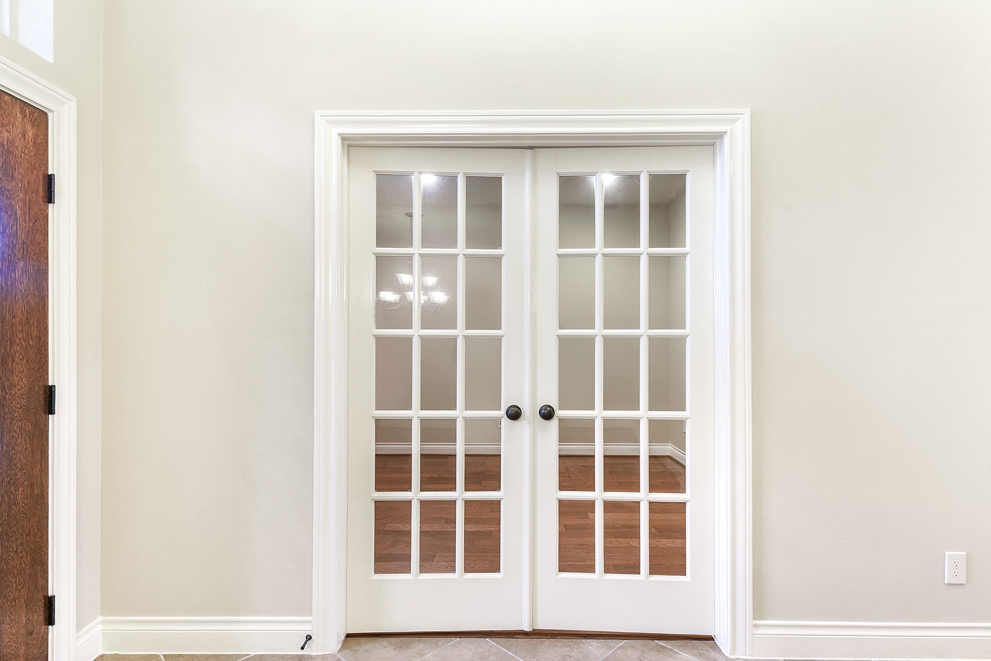 29023 Powder Ridge Drive Katy, TX 77494 - Photo 9 of 50 Elegant French doors lead into the spacious home office, which offers beautiful views of the front yard and plenty of natural light.