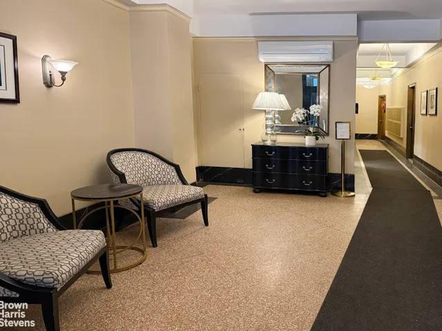 a bathroom with a toilet and a bathtub