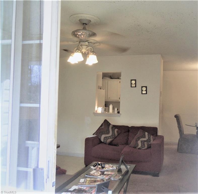 5669 Hornaday Road Greensboro, NC 27409 - Photo 11 of 13 View of family room from the back porch