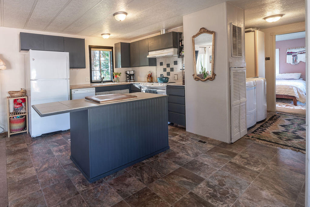 64900 Hunnell Road, Unit 51 Bend, OR 97703 - Photo 6 of 29 Kitchen & laundry area
