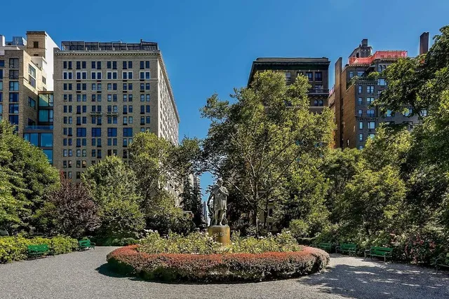 a close view of a fireplace and cabinets