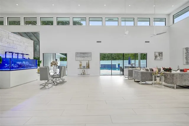 a kitchen with stainless steel appliances a stove a microwave and a refrigerator