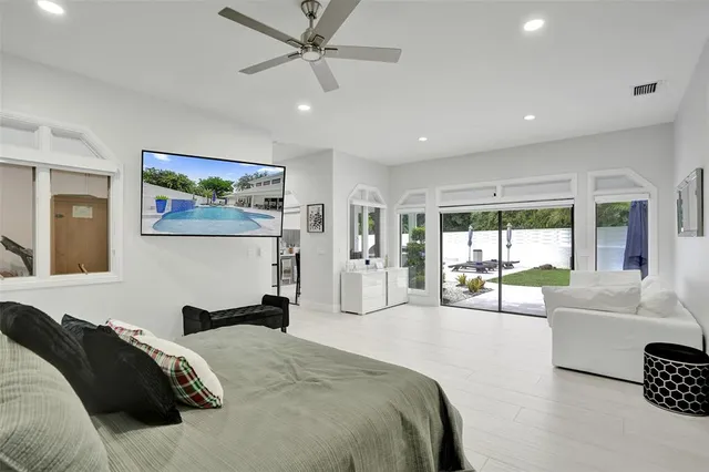 a view of a workspace with furniture and a fireplace