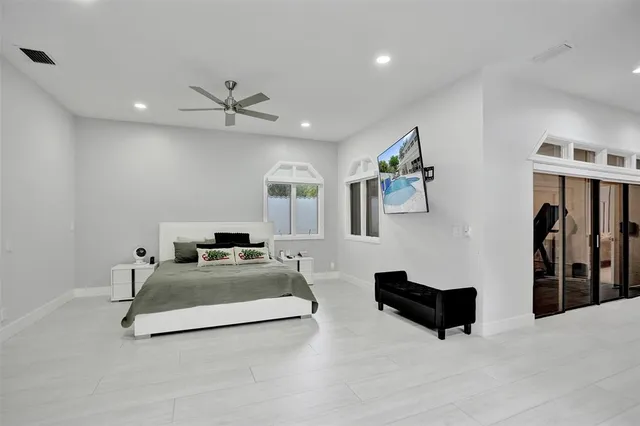 a bathroom with a toilet a sink and a mirror