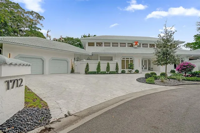 a view of a livingroom with furniture and a table