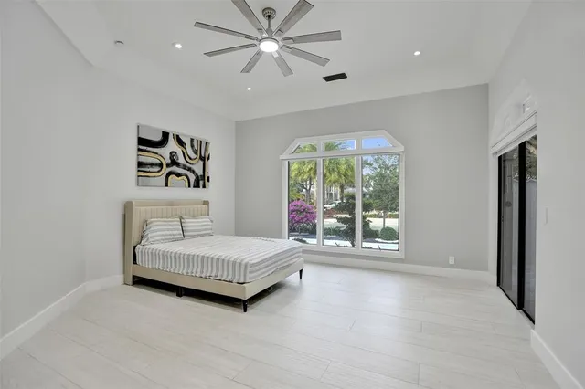 a kitchen with a stove a sink and a refrigerator