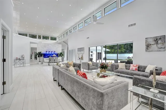 a dining table with chairs and kitchen