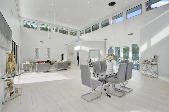 a kitchen with stainless steel appliances a stove a sink and a refrigerator