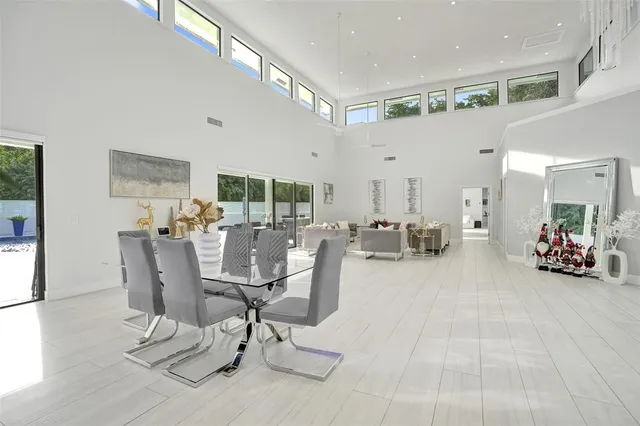 a kitchen with stainless steel appliances granite countertop a stove top oven sink and cabinets
