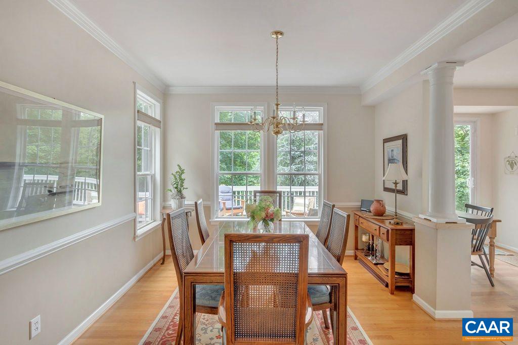 5363 Windy Ridge Road Charlottesville, VA 22903 - Photo 17 of 49 a view of a dining room with furniture window and wooden floor