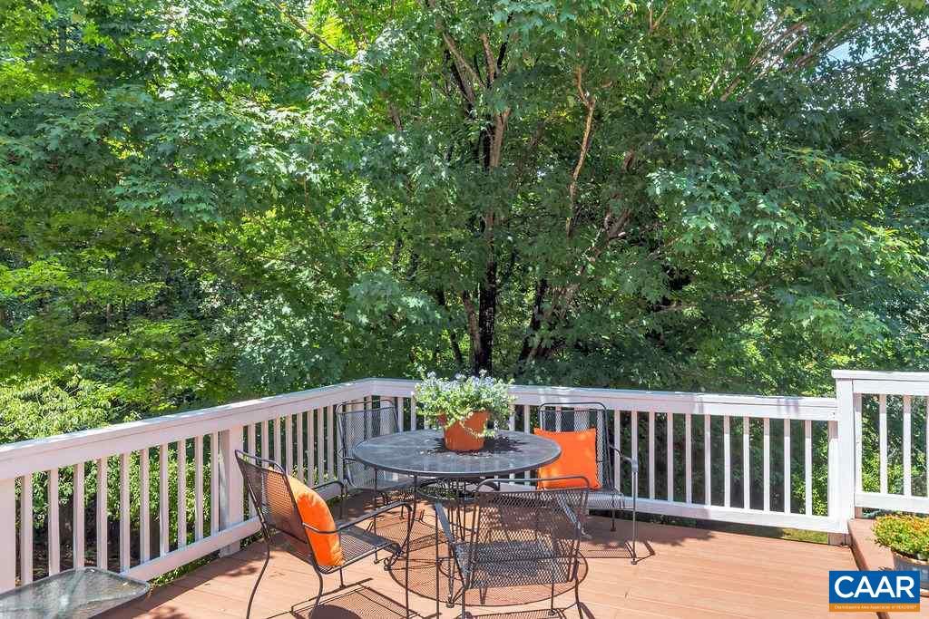 5363 Windy Ridge Road Charlottesville, VA 22903 - Photo 36 of 49 a balcony with chairs