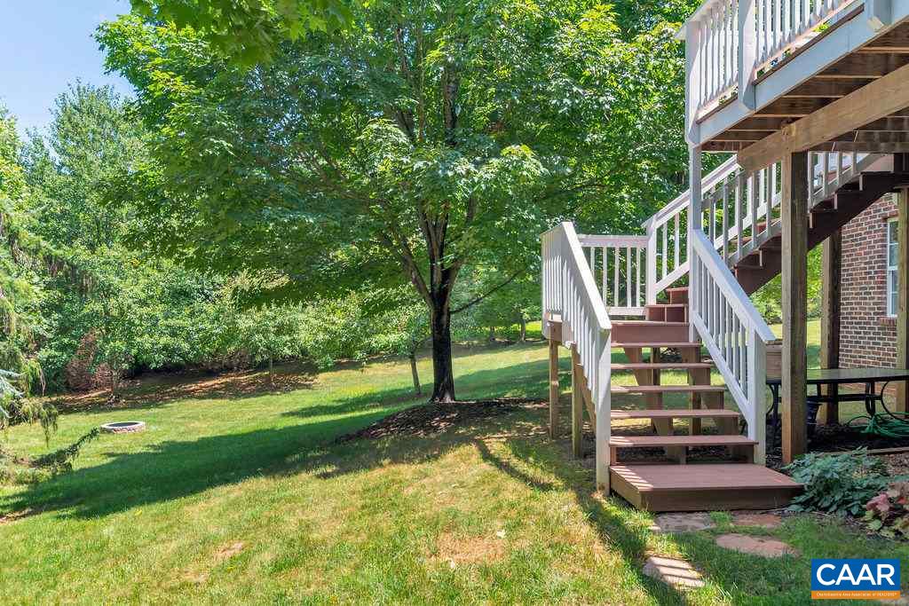 5363 Windy Ridge Road Charlottesville, VA 22903 - Photo 38 of 49 a view of an house with backyard and trees