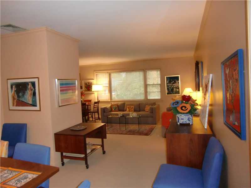7 Dorchester Lane Riverside, CT 06878 - Photo 3 of 7 a living room with furniture and a large window