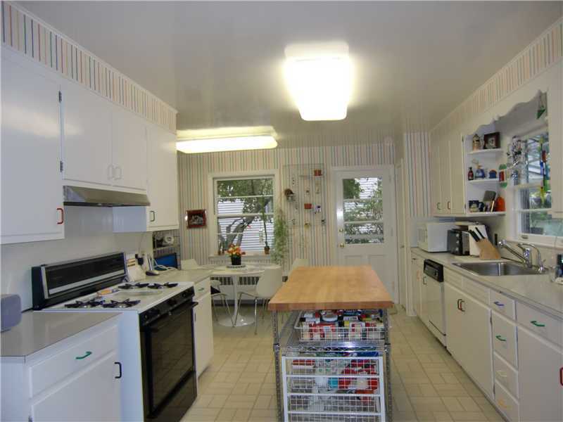 7 Dorchester Lane Riverside, CT 06878 - Photo 5 of 7 a kitchen that has a lot of cabinets in it