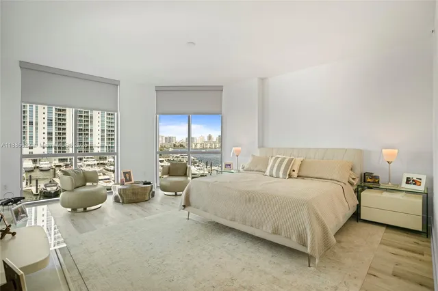 a bathroom with a double vanity sink mirror and toilet