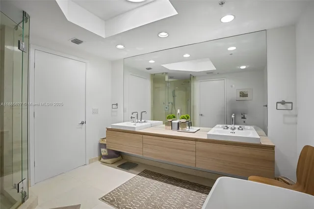 a bathroom with a shower and a toilet