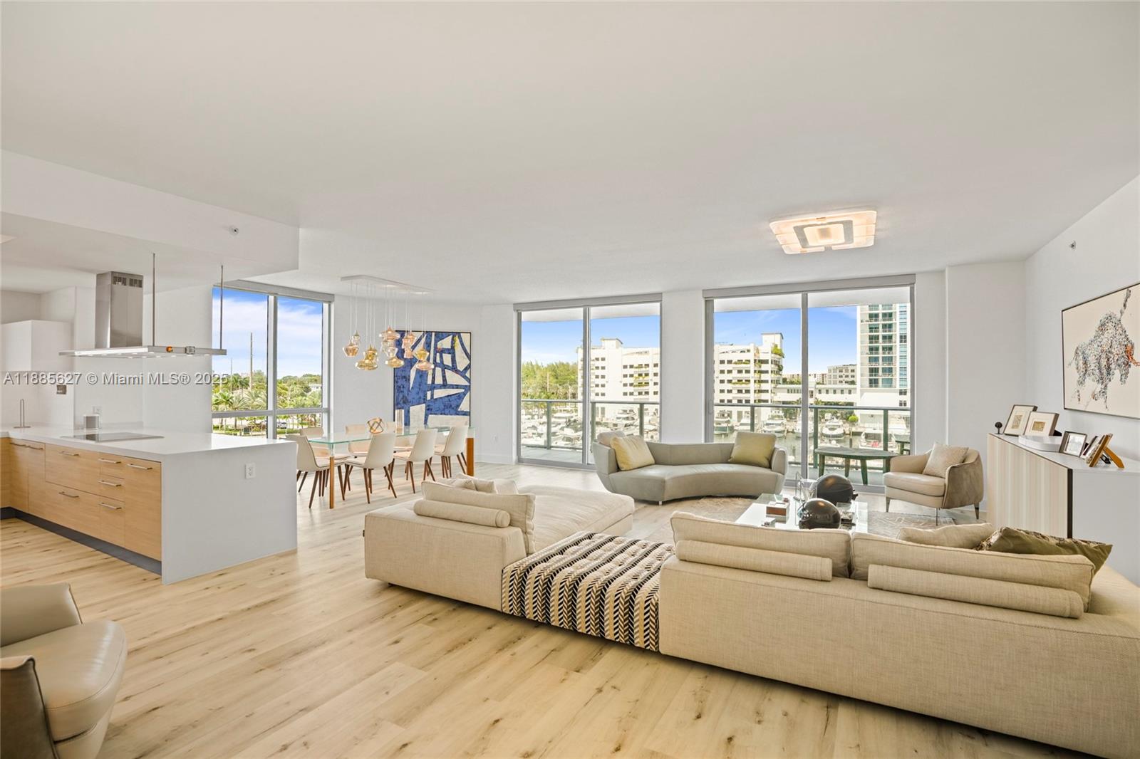 17111 Biscayne Boulevard, Unit 401 North Miami Beach, FL 33160 - Photo 3 of 66 a living room with furniture and a large window