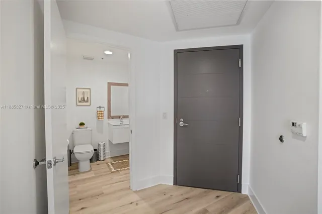 a view of a city with tall buildings