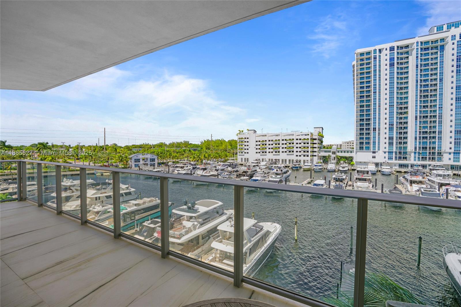 17111 Biscayne Boulevard, Unit 401 North Miami Beach, FL 33160 - Photo 41 of 66 a view of a terrace with skyline