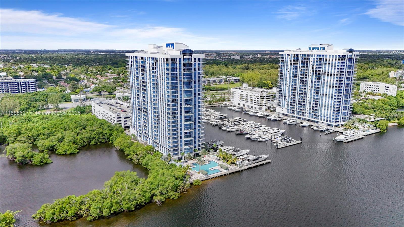 17111 Biscayne Boulevard, Unit 401 North Miami Beach, FL 33160 - Photo 52 of 66 a view of a city and an ocean view