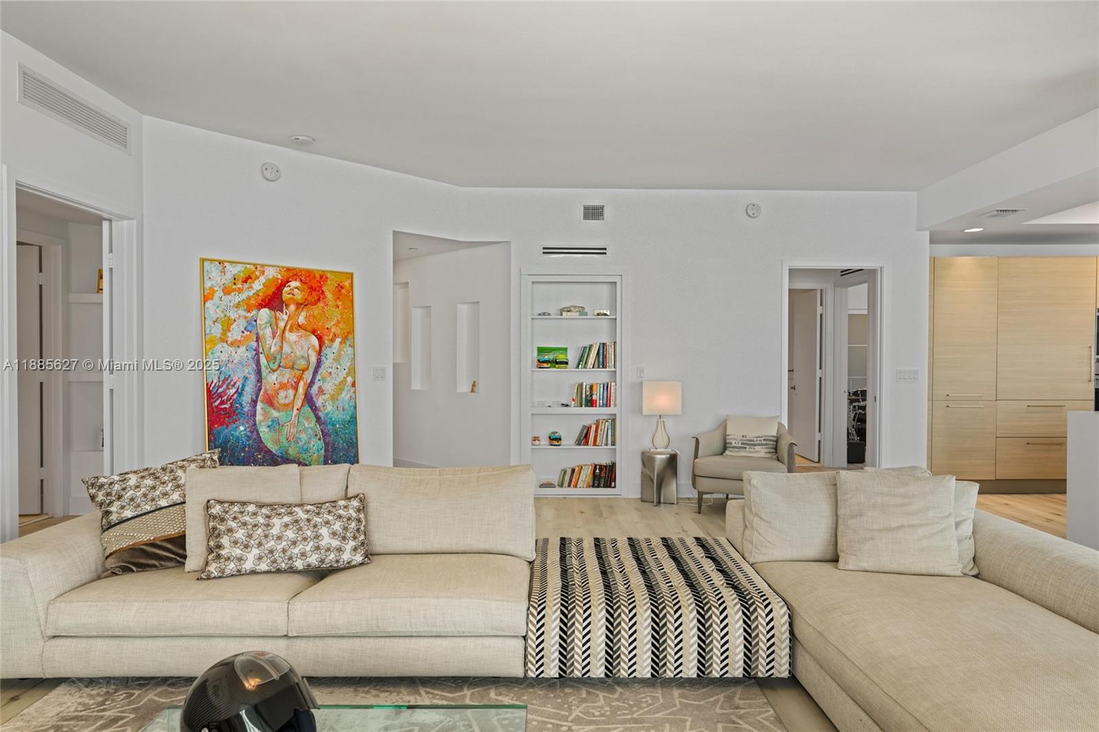 17111 Biscayne Boulevard, Unit 401 North Miami Beach, FL 33160 - Photo 8 of 66 a living room with furniture and a couch