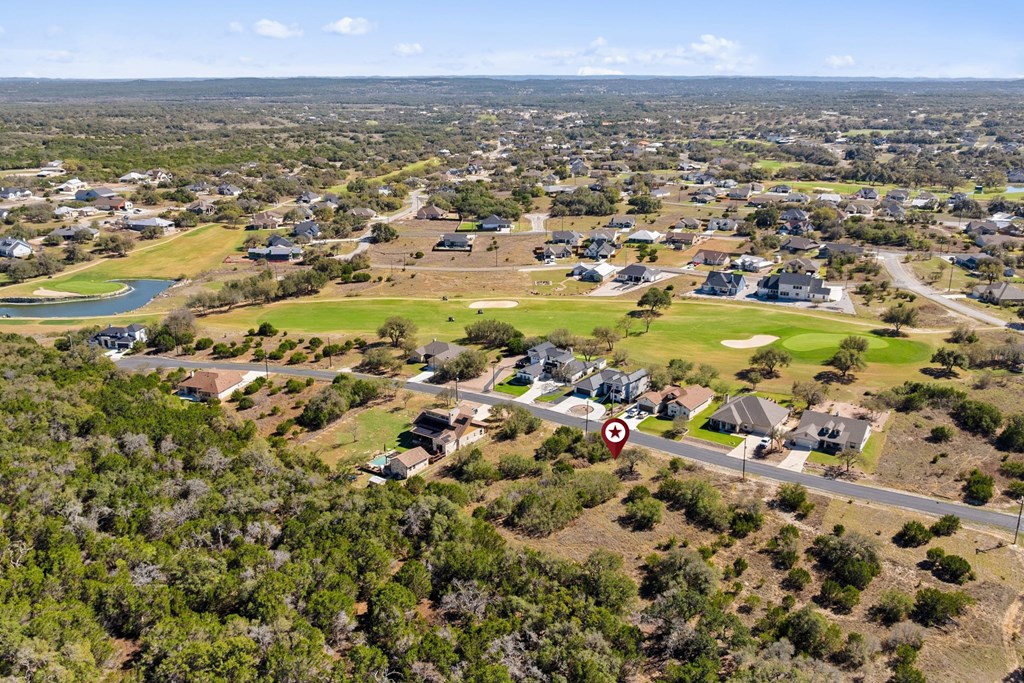 207 North Calvin Barrett, Unit 220 Blanco, TX 78606 - Photo 8 of 18 an aerial view of residential houses with outdoor space