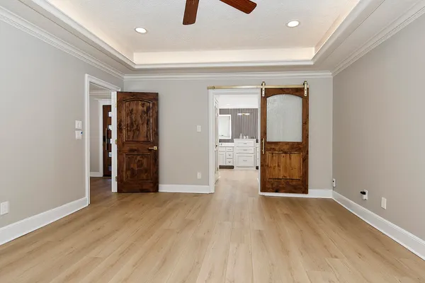 a bathroom with a double vanity sink and mirror