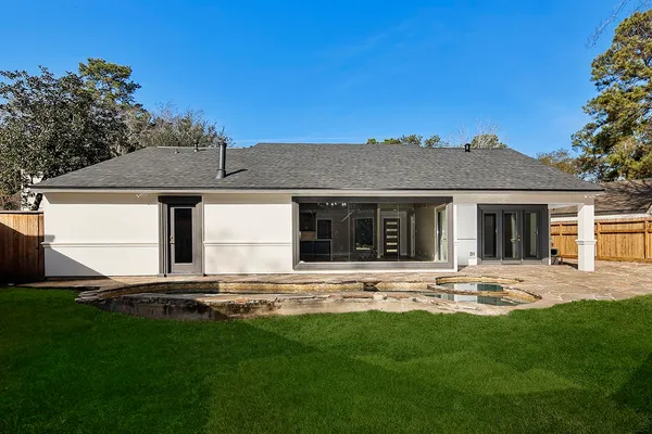 a swimming pool with a yard