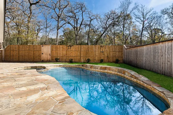 a view of a backyard of a house