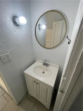 a bathroom with a toilet and a sink