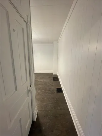 a view of hallway with shower