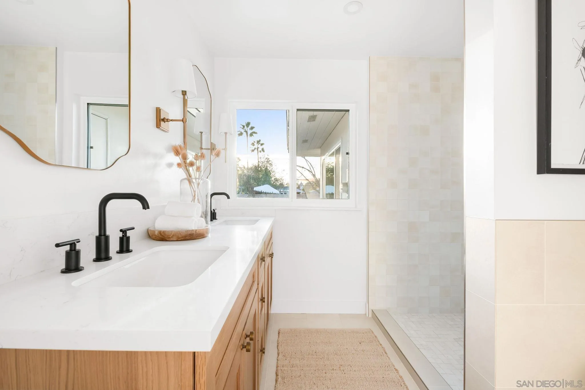 486 Murray Drive El Cajon, CA 92020 - Photo 15 of 22 a bathroom with a sink and a mirror