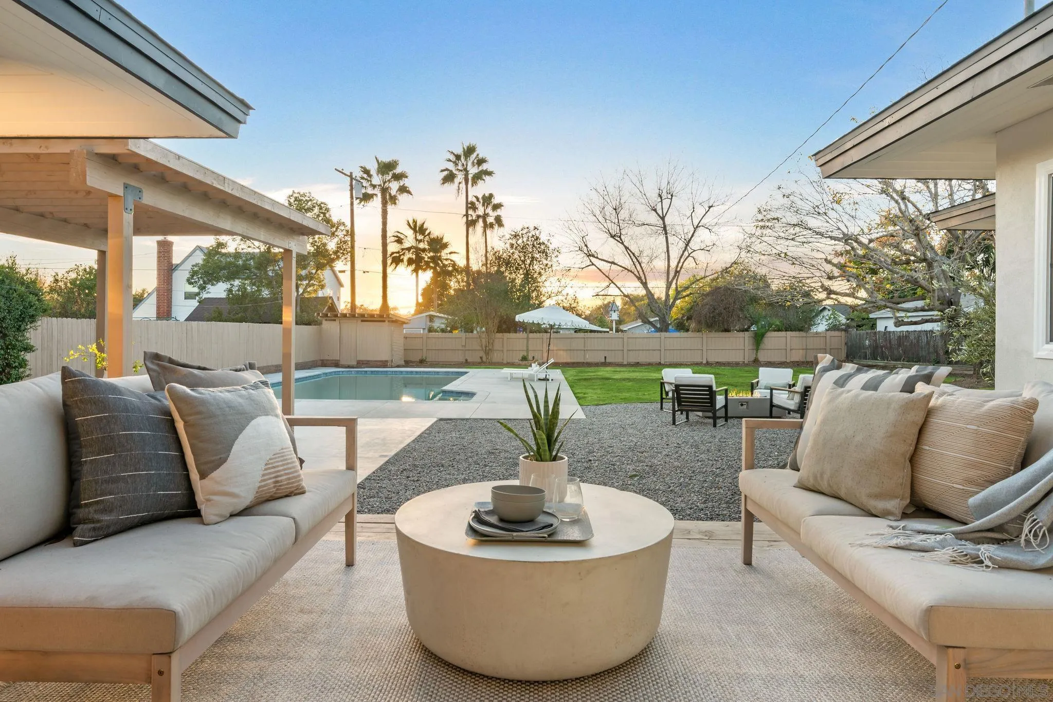 486 Murray Drive El Cajon, CA 92020 - Photo 22 of 22 a living room with patio furniture and a potted plant