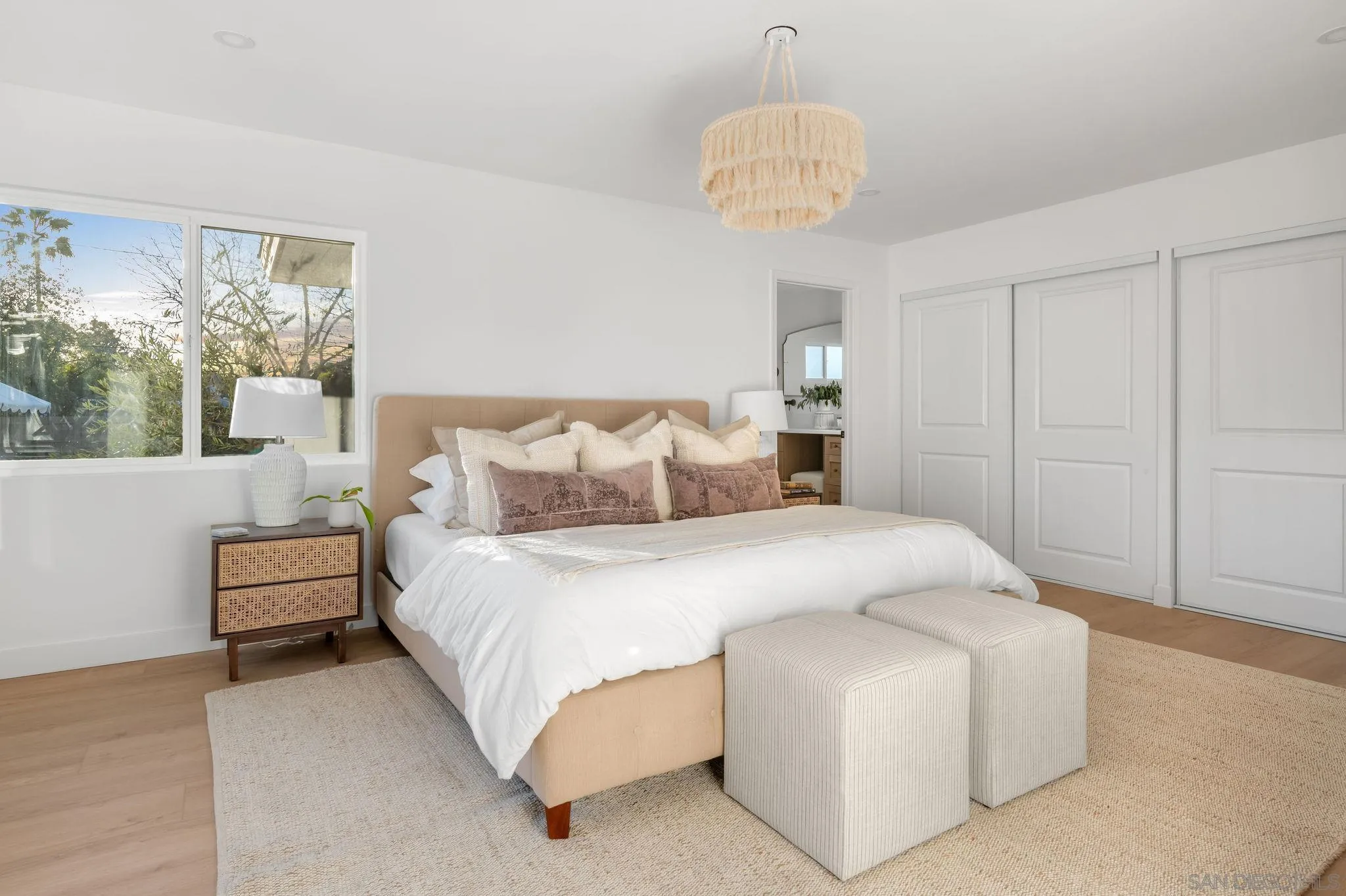 486 Murray Drive El Cajon, CA 92020 - Photo 10 of 22 a bedroom with bed and a chandelier