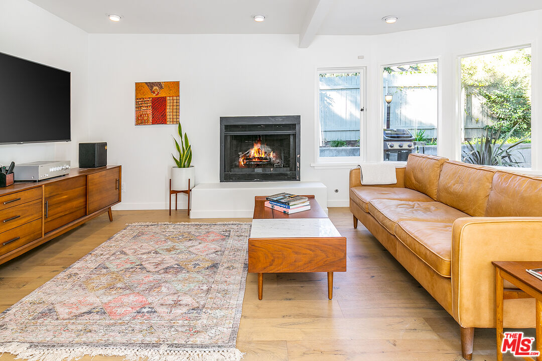 2386 Allen Avenue Altadena, CA 91001 - Photo 17 of 41 a living room with furniture and a flat screen tv