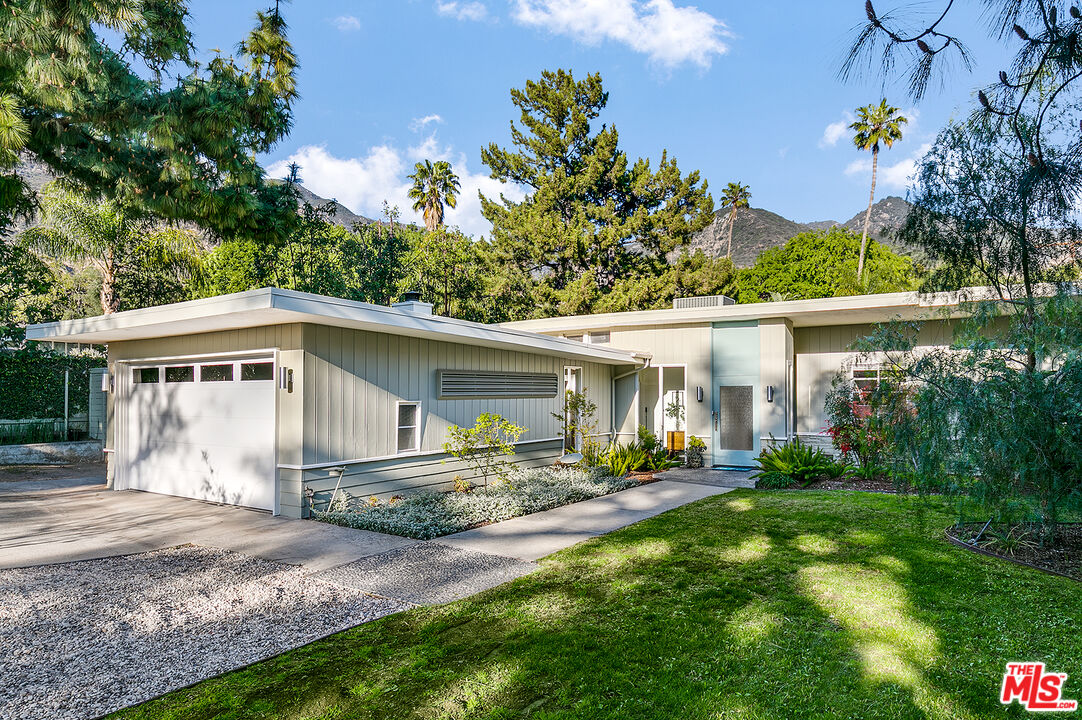 2386 Allen Avenue Altadena, CA 91001 - Photo 2 of 41 a front view of a house with a yard and potted plants