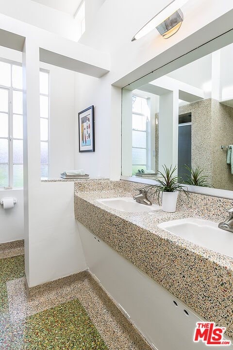 2386 Allen Avenue Altadena, CA 91001 - Photo 25 of 41 a bathroom with a granite countertop sink and a mirror
