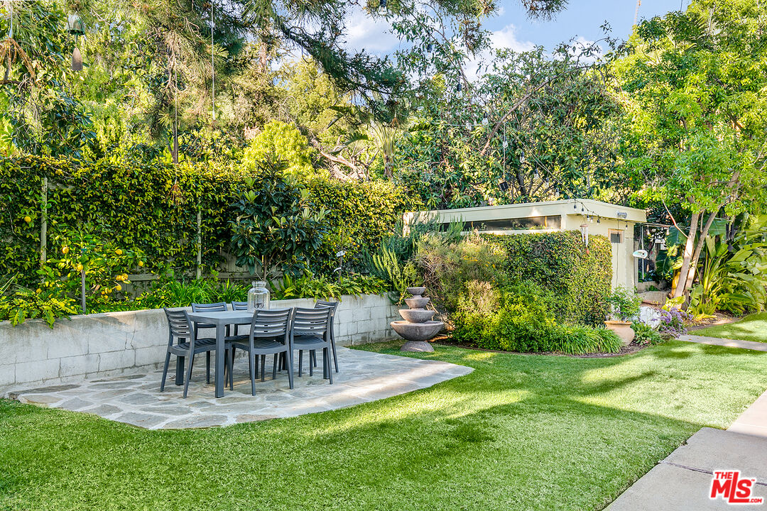 2386 Allen Avenue Altadena, CA 91001 - Photo 32 of 41 a view of backyard with a table and chairs