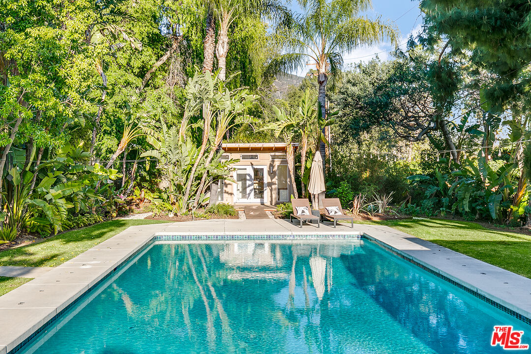2386 Allen Avenue Altadena, CA 91001 - Photo 34 of 41 a view of swimming pool with lawn chairs and plants