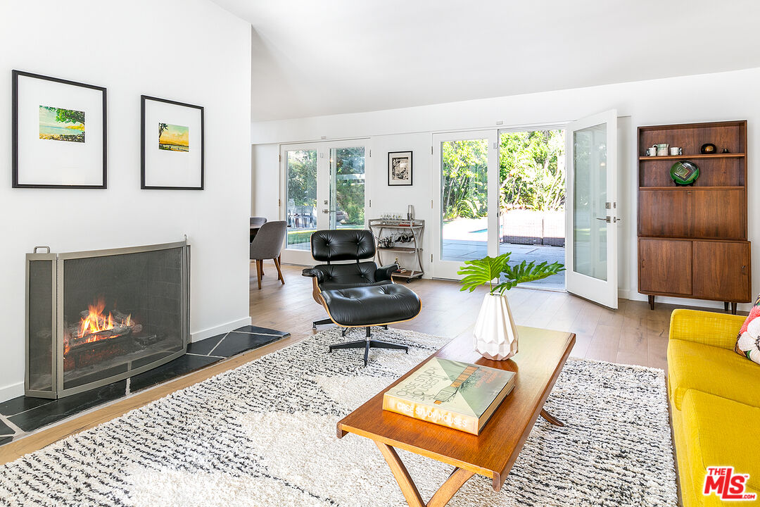 2386 Allen Avenue Altadena, CA 91001 - Photo 6 of 41 a living room with furniture a window and a fireplace