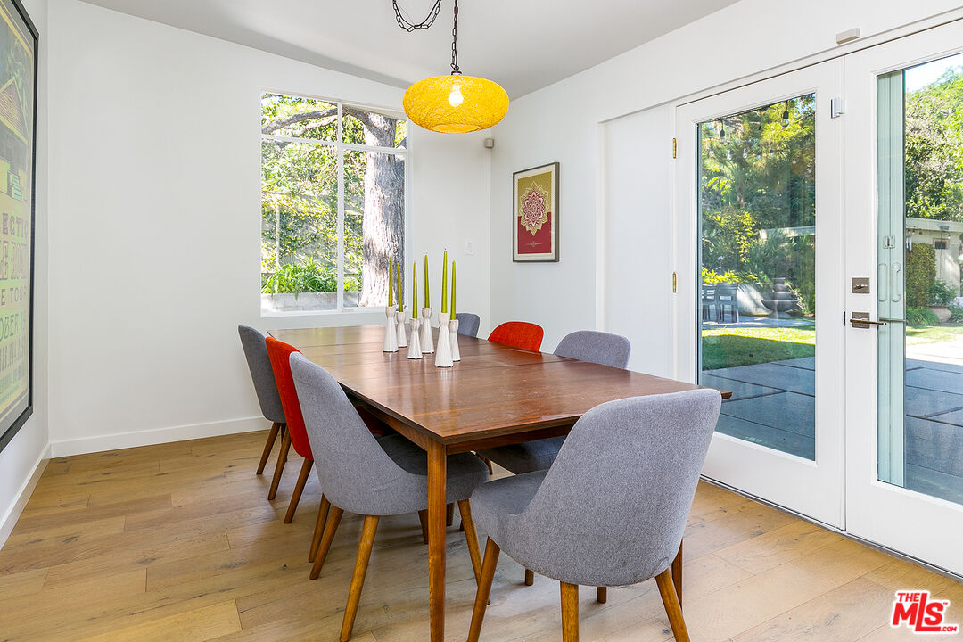 2386 Allen Avenue Altadena, CA 91001 - Photo 9 of 41 a view of a dining room with furniture and wooden floor